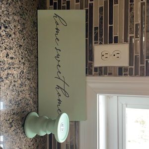 Wooden sign and candle holder